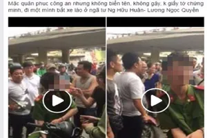 1 thanh niên mặc đồ công an có biểu hiện say, chặn xe 