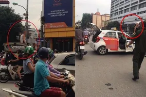 Bị dừng xe, tài xế taxi leo lên nóc 'ăn vạ'