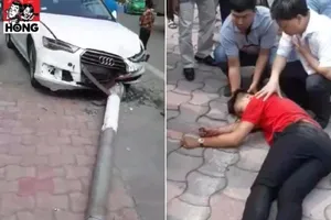 Xế hộp tông đổ cột điện, rơi trúng người đi đường