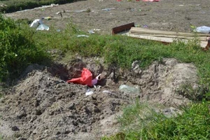 Phát hiện thi thể bé trai bị vùi dưới đất