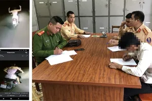 Nam thanh niên mặc váy hồng đi xe máy, buông cả hai tay