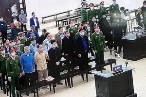 Các bị cáo tại tòa sáng 8-3. Ảnh: TP