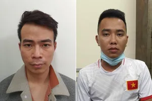 Nguyễn Văn Đức (trái) và Lương Thanh Miều tại cơ quan công an