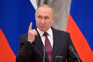 Tổng thống Nga Vladimir Putin trong cuộc họp báo ngày 18-2. Ảnh: REUTERS