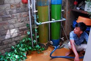 Dùng nước bẩn trong khu dân cư 