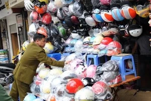 Phạt mũ bảo hiểm: Rốt cuộc các bộ muốn gì?