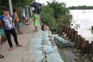 Hàng ngàn hộ dân thấp thỏm chờ di dời