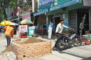 TP.HCM: Khắc phục hậu quả đường cao hơn nhà dân