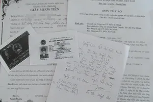 Vợ một công an gán thẻ giả của chồng vay tiền tỉ