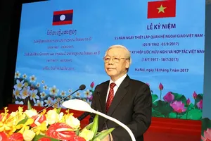 ‘Hai dân tộc Việt Nam và Lào luôn kề vai sát cánh’