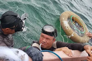 Tàn tật sau 6 giờ lặn biển