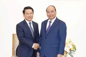 Thủ tướng đề nghị Lào tháo gỡ khó khăn cho DN Việt Nam