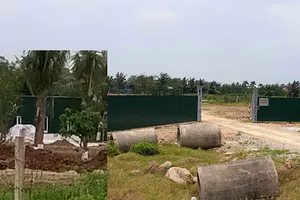 Cán bộ bị ném xuống hồ khi kiểm tra nhà không phép