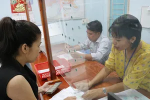 TP.HCM: Cán bộ bị dồn việc khi giảm gần 2.300 người