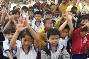 Đảng viên sinh con thứ ba trở lên có phạm luật?