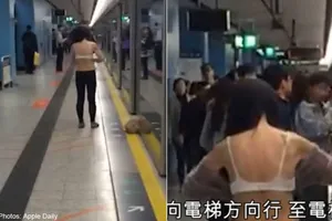 Bất ngờ: Người phụ nữ tự lột đồ giữa sân ga 