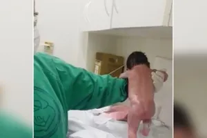 Clip: Bé gái mới sinh vài phút đã … biết đi