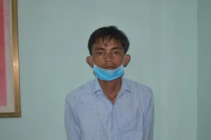 Lê Văn Triều tại cơ quan công an. Ảnh: CA