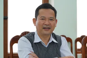 Chủ tịch huyện Phước Sơn Lê Quang Trung nói về vụ 'gỗ chưa rõ nguồn gốc' trên đất Trưởng phòng Nội vụ huyện. Ảnh: TN