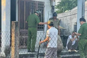 Người tâm thần gây án chết người đang bị công an tạm giữ. Ảnh: CTV