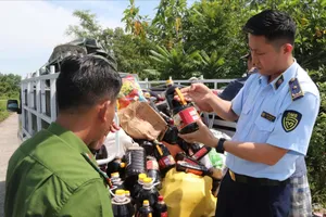 Thông tin mới vụ cả ngàn chai nước mắm vứt bỏ bên đường