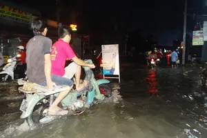 Xây đê bao kín thành phố để chống ngập?