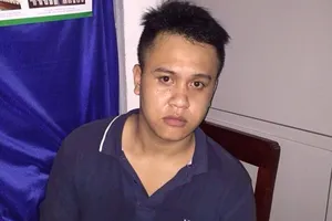 Bắt đối tượng truy nã khi đang ... chơi game bắn cá