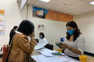 Hồ sơ làm thủ tục chứng nhận lãnh sự tăng đột biến, cán bộ tăng cường làm thêm giờ