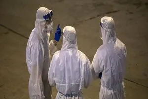 Nhóm chuyên gia của WHO được gửi đến Trung Quốc ngày 10-2. Ảnh: BLOOMBERG 