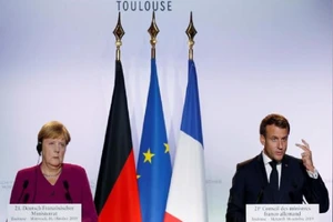 Thủ tướng Đức Angela Merkel và Tổng thống Pháp Emmanuel Macron trong một cuộc họp báo hồi tháng 10-2019. Ảnh: REUTERS