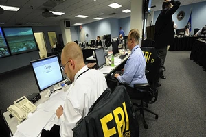 FBI nói rằng Nga đang can thiệp vào bầu cử Mỹ để làm chia rẽ nước Mỹ. Ảnh: AP