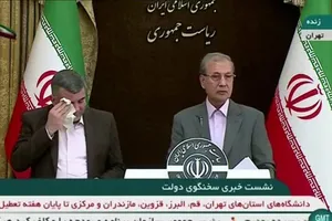 Thứ trưởng Bộ Y tế Iran Iraj Harirchi trong buổi họp báo ngày 24-2. Ảnh: ABAS ASLANI