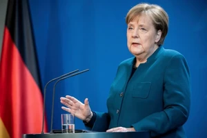 Thủ tướng Đức Angela Merkel trong cuộc họp báo ngày 19-3 về tình hình dịch COVID-19 ở Đức. Ảnh: REUTERS 