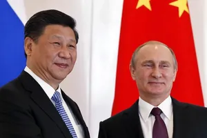 Chủ tịch Trung Quốc Tập Cận Bình và Tổng thống Nga Vladimir Putin. Ảnh: YURI KOCHETKOV—EPA