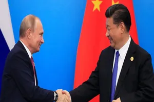 Tổng thống Nga Vladimir Putin và Chủ tịch Trung Quốc Tập Cận Bình. Ảnh: REUTERS.