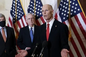 Thượng nghị sĩ Rick Scott (phải). Ảnh: AP