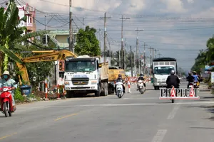 Khối lượng giải ngân dự án nâng cấp Quốc lộ 1A đoạn qua Hậu Giang, Sóc Trăng còn thấp