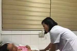 Việt Nam phẫu thuật thành công cho thai nhi còn trong bụng mẹ