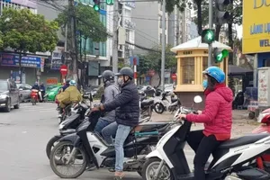 Từ đêm 26-2 đến ngày mai, 27-2, do ảnh hưởng của không khí lạnh nên Hà Nội có mưa nhỏ, trời chuyển rét. Ảnh minh họa: AH