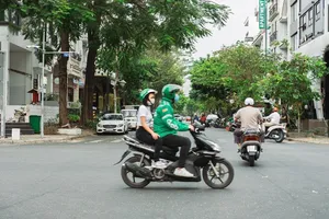 Bộ Công Thương yêu cầu Grab làm rõ cơ sở nào để thu phụ phí nắng nóng