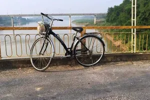 Tìm nữ cử nhân nghi gieo mình xuống sông Lam