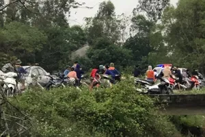 Vụ thi thể người cạnh bao tải đựng chó: Bắt nghi can nổ súng 