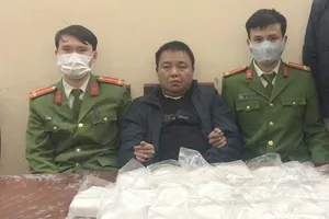 Trên đường mang 19 bánh heroin ra phía Bắc thì bị bắt giữ 