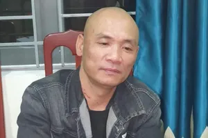 Trần Quang Trung tại cơ quan công an. Ảnh: CA