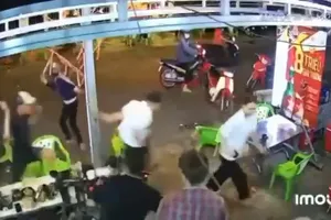 Đánh nhau ở quán nhậu, xử mấy tội?