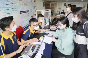 Thí sinh trúng tuyển xác nhận nhập học tại các cơ sở đào tạo ở TP.HCM trong đợt 1 vừa qua. Ảnh: HOÀNG GIANG
