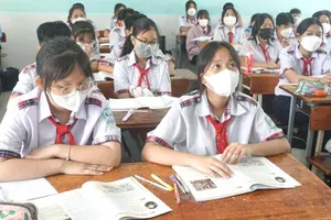 Học sinh Trường THCS Lý Tự Trọng (quận Gò Vấp) trong một tiết học. Ảnh: NGUYỄN QUYÊN