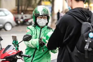 Nhiều đối tượng tới đây sẽ được tham gia BHXH bắt buộc. Ảnh: V.LONG