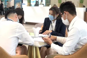 Sự phát triển của thị trường đòi hỏi các nhà môi giới bất động sản ngày càng phải chuyên nghiệp hơn. Ảnh minh họa: MINH LONG