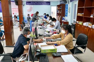 Xây dựng vị trí việc làm của cán bộ, công chức là một trong những cơ sở để thực hiện việc cải cách tiền lương. Ảnh: BẢO PHƯƠNG